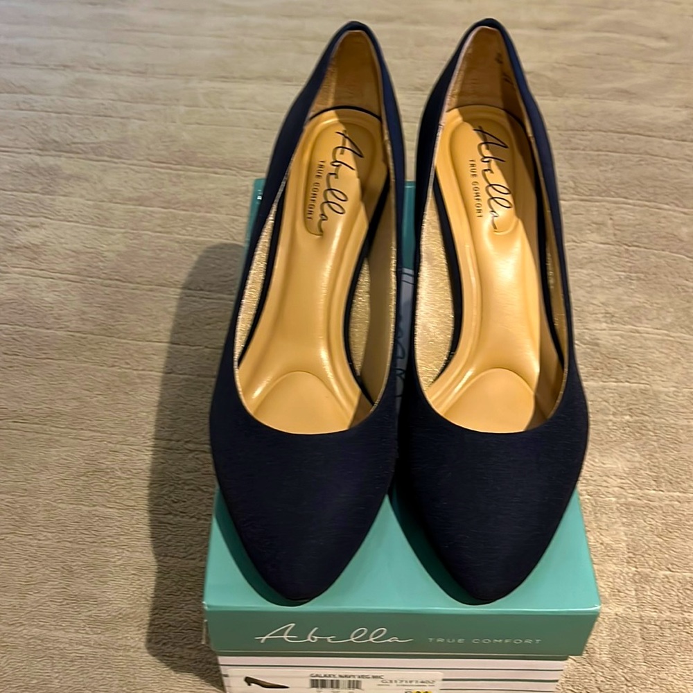 New in box navy cloth Abella true comfort heels. Size 8.